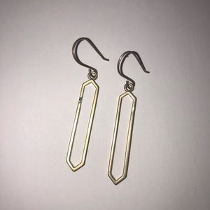 Long diamond earrings in gold